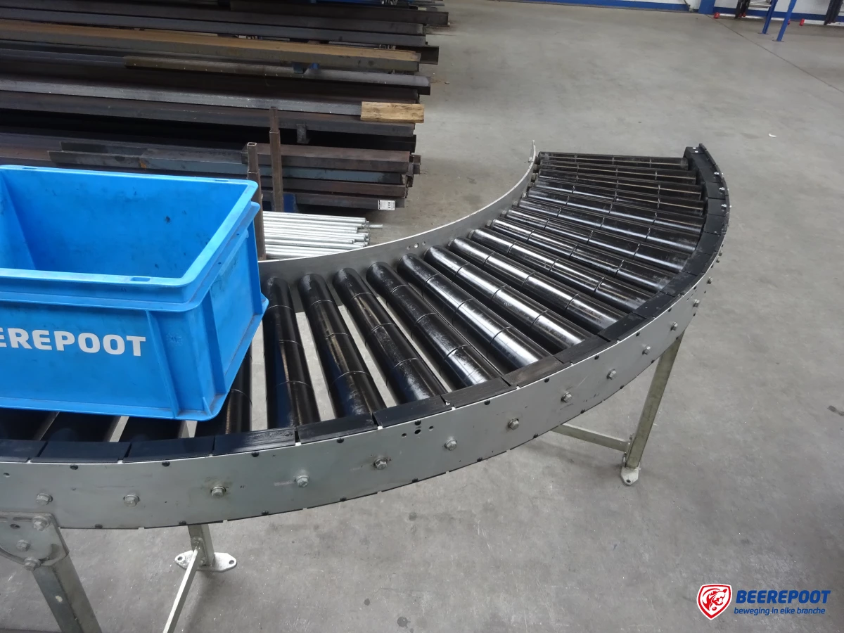 Aangedreven rollenbaanbocht